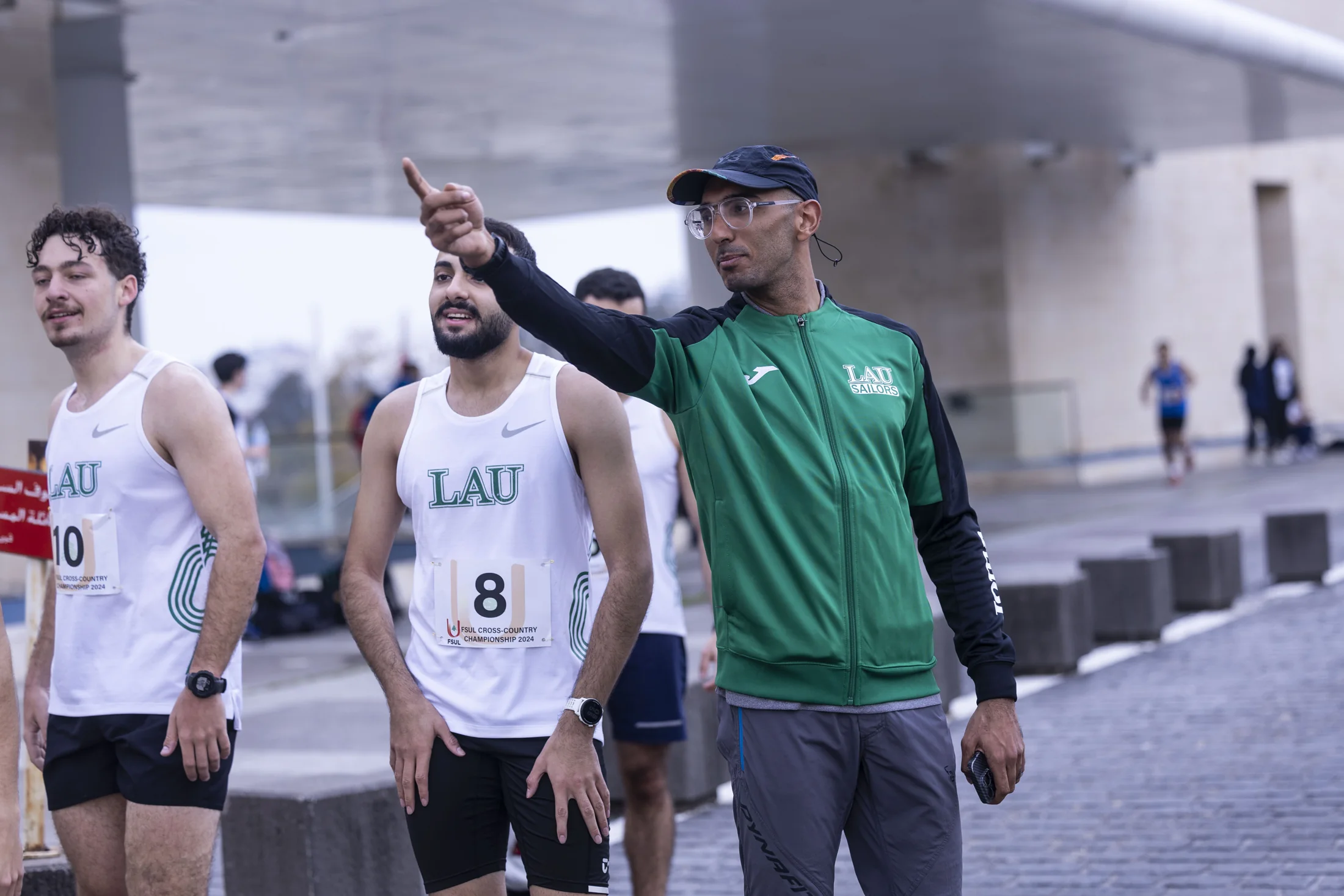 Karim Ramadan coaching at a race